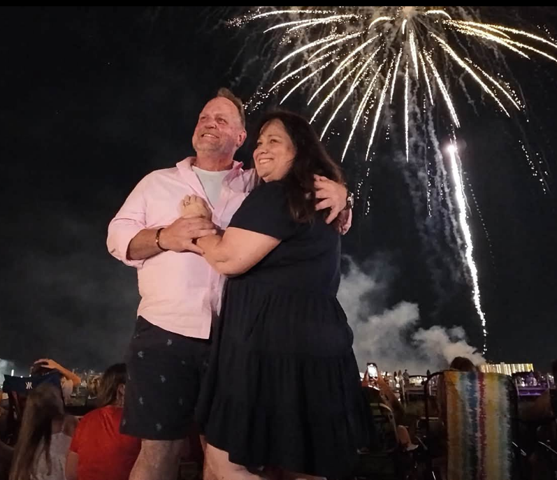 Michael and Jan together beneath fireworks