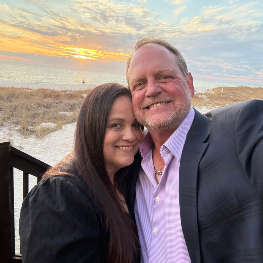 Michael and Jan together on the beach at sunset